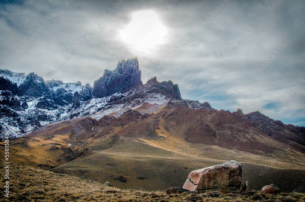 Mountaineous mountain range shaped like a man sleeping in winter of Patagonia with many colors. Mountaineous mountain range shaped like a man sleeping in winter of Patagonia with many colors.