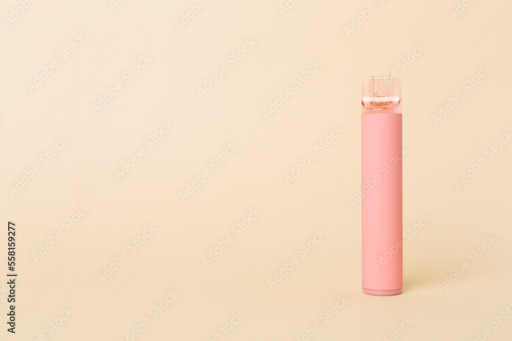 Disposable electronic cigarette on color background Disposable electronic cigarette on color background