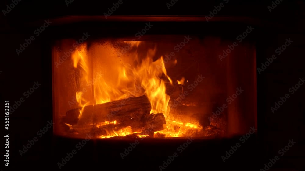 fire in a fireplace with dark background fire in a fireplace with dark background