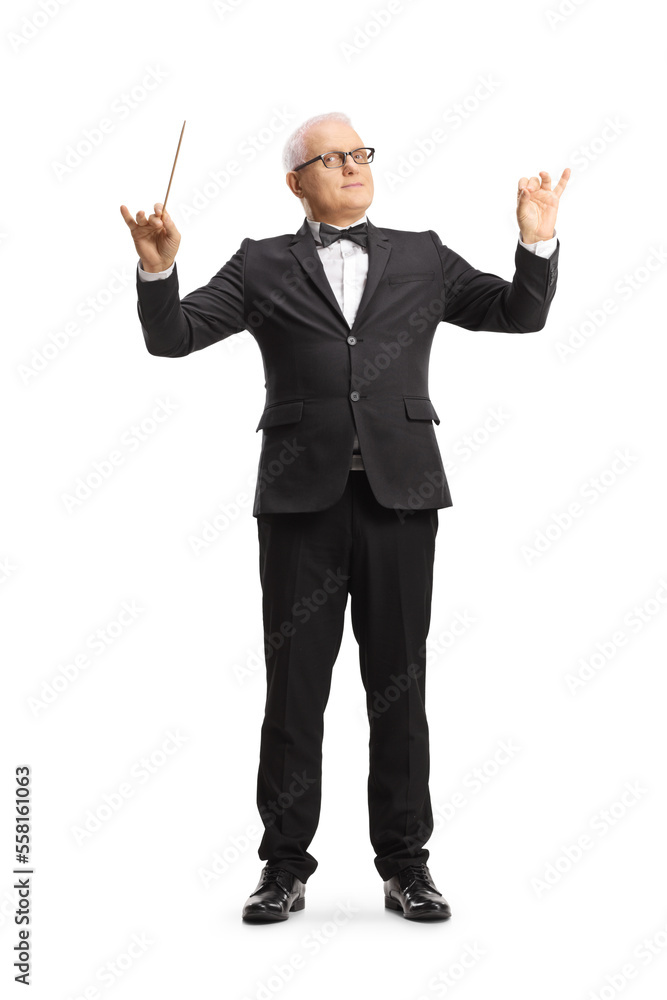 Full length portrait of a music conductor directing a performance Full length portrait of a music conductor directing a performance