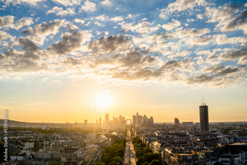Cityscape of the city of Paris on top of the Arch of Triumph during the sunset