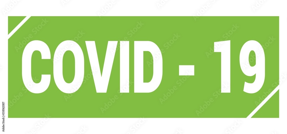 COVID - 19 text written on green stamp sign. COVID - 19 text written on green stamp sign.