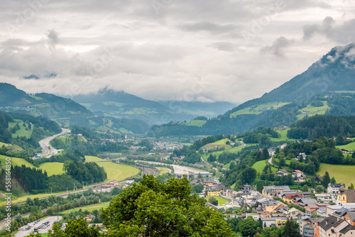 View over the Salzach river valley near town of Werfen, Austria on a cloudy rainy day.