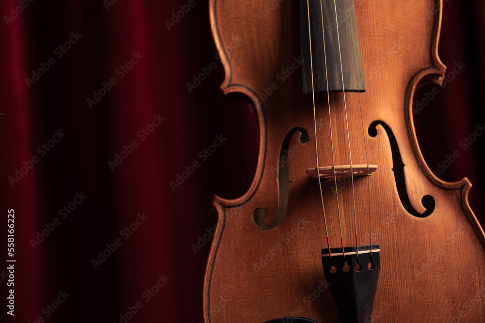 Old retro wooden violin on a background. Old retro wooden violin on a background.