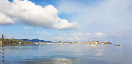 Seascape overlooking the city of Portoferraio, Elba island.Panorama of calm sea with boats.