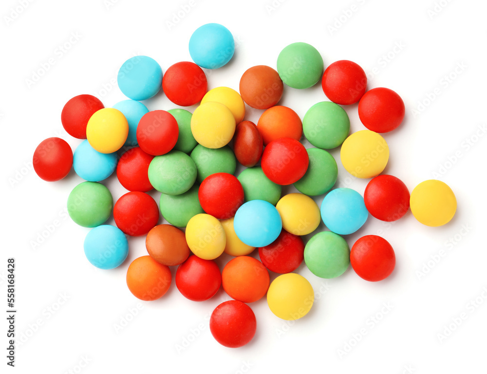 Many small colorful candies on white background, top view Many small colorful candies on white background, top view