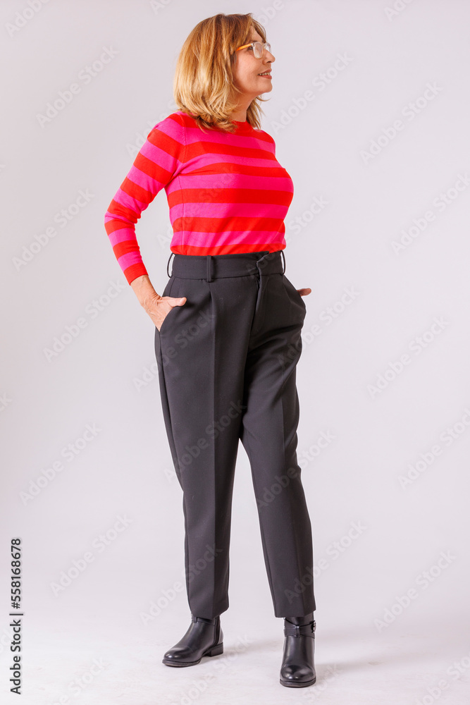 Executive blonde model over 50 years in photo studio Executive blonde model over 50 years in photo studio