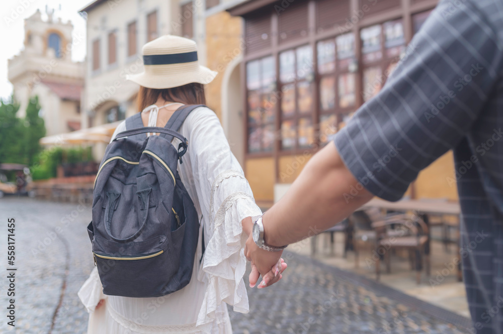 Happy Young asian couple travel at old town italy style,Honeymoon couples after marriage,Toursit concept,Valentine festival