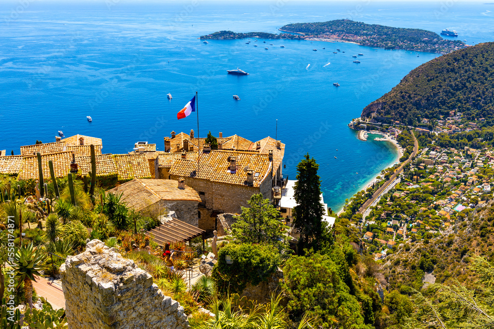 Panoramic view of Eze Bord de Mer, Silva Maris port and St. Jean Cap Ferrat cape seen from historic town of Eze over Azure Cost of Mediterranean Sea in France