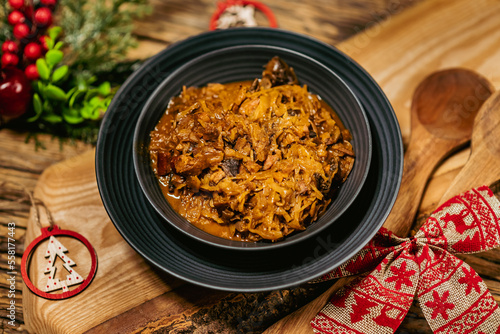 Homemade sauerkraut stew with mushrooms. Traditional Polish bigos.