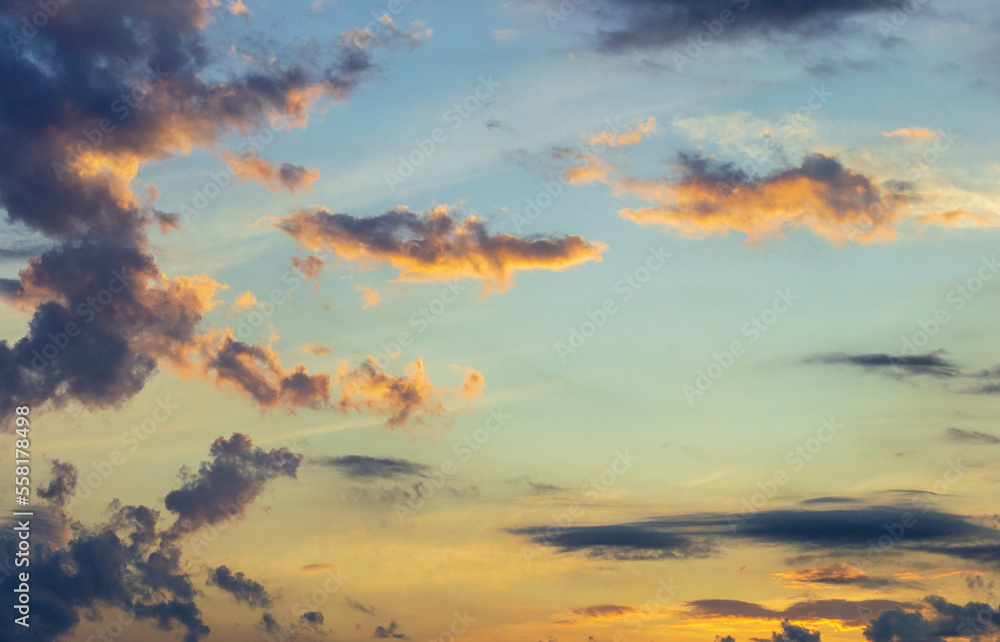 Cloudscape at dawn  with nice orange and blue colors and gradients