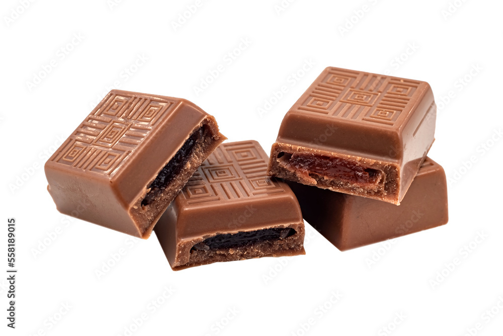 Pieces of chocolate with filling on a white background. Chocolate bar isolate Pieces of chocolate with filling on a white background. Chocolate bar isolate