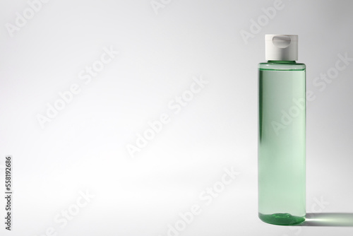 Bottle of micellar water on white background. Space for text