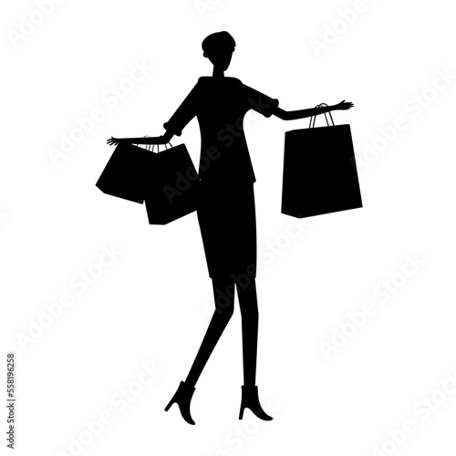 silhouette of a girl with a large pile of shopping bags
