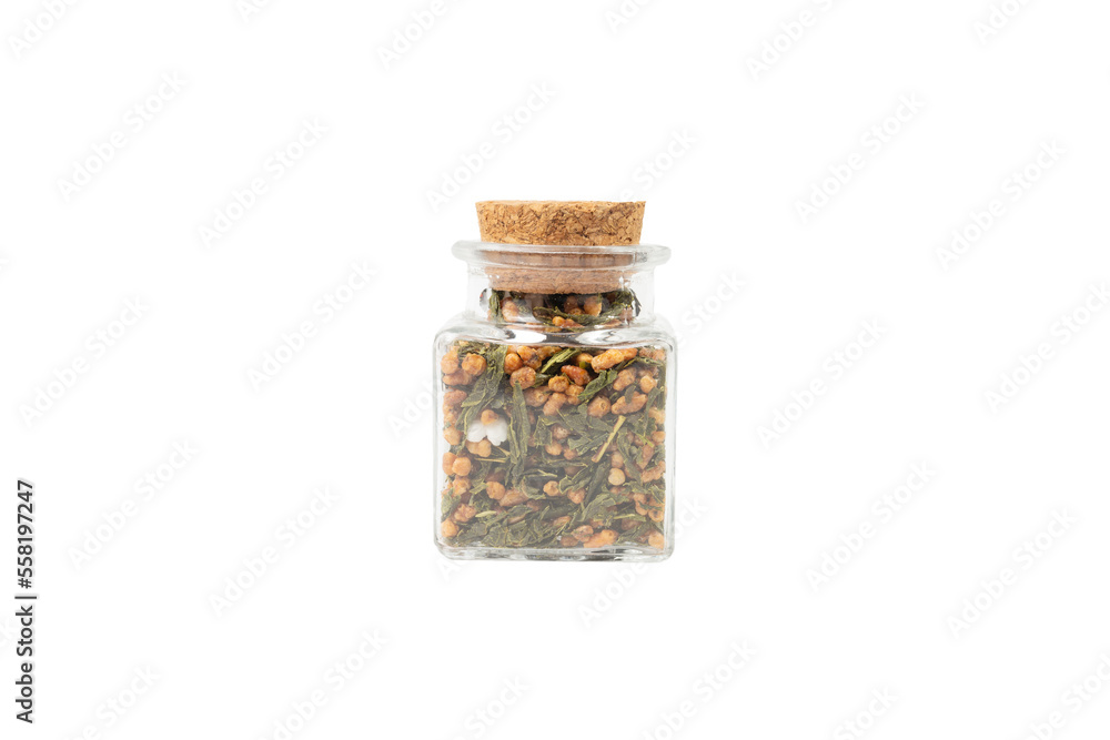 Green tea Japanese Genmaicha. Green tea mixed with roasted popped brown rice in a glass jar isolated on white background. Green tea Japanese Genmaicha. Green tea mixed with roasted popped brown rice in a glass jar isolated on white background.
