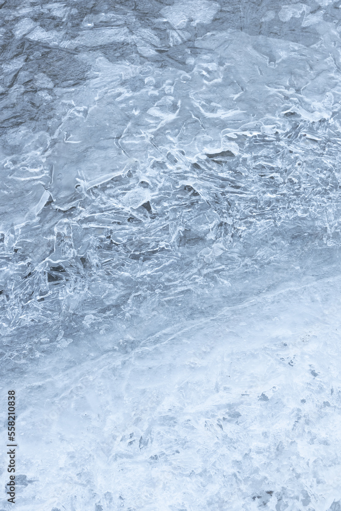 Abstract background of ice texture on a frozen river.