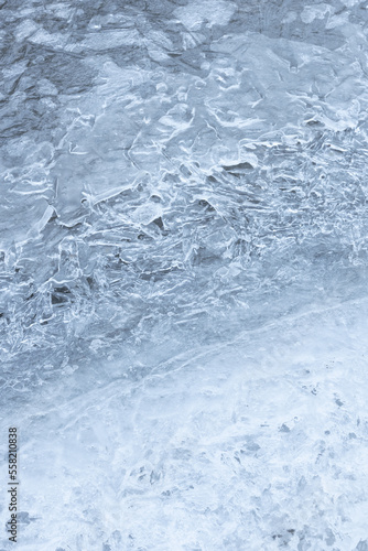 Abstract background of ice texture on a frozen river.