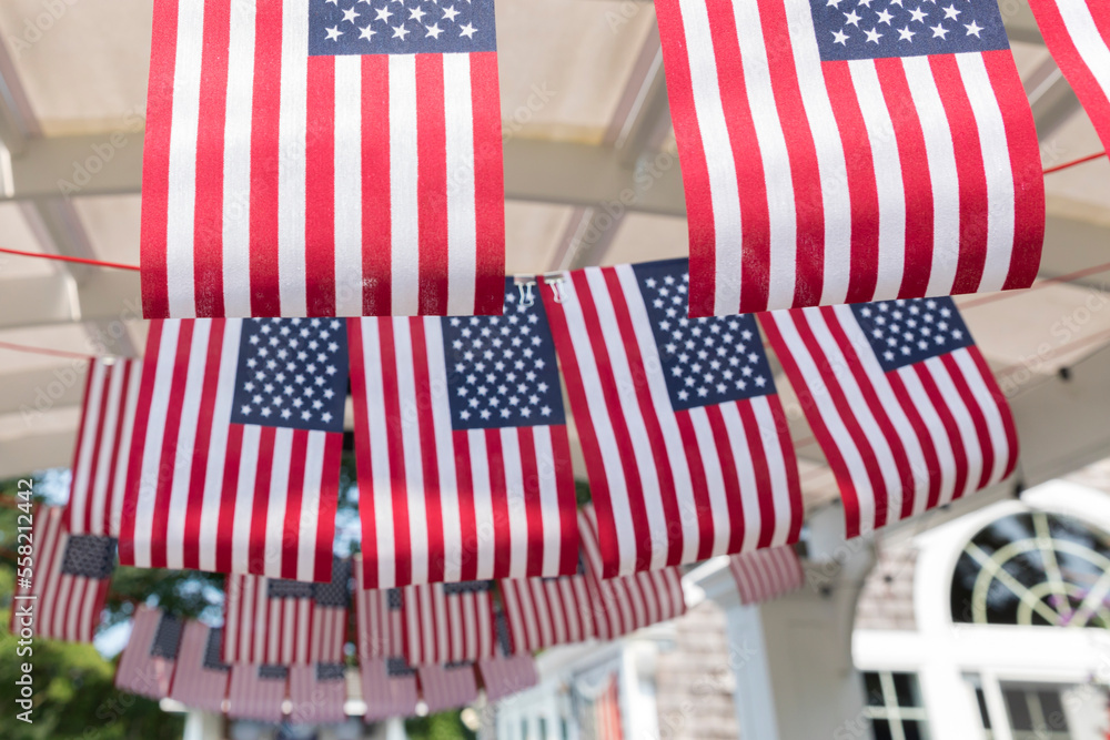 strings of American flags hanging as fourth of July party decor strings of American flags hanging as fourth of July party decor