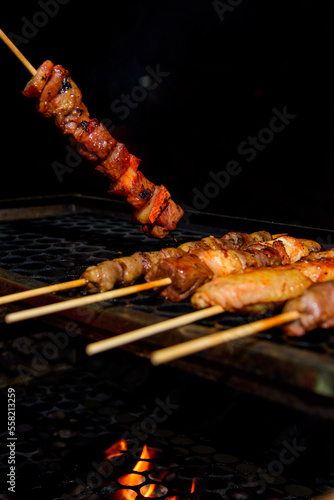 Churrasco, espetinho misto com carne, frango, bacon photo