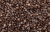 Close-up of roasted brown coffee beans background 