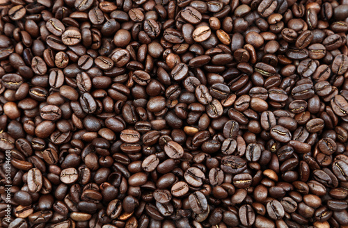 Close-up of roasted brown coffee beans background 