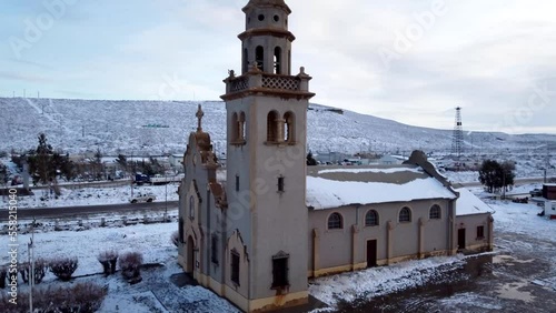 aerial view of a snow-covered church