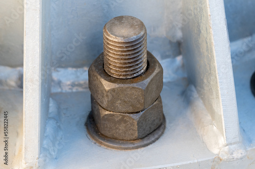 steel pole base locked with big bold nuts