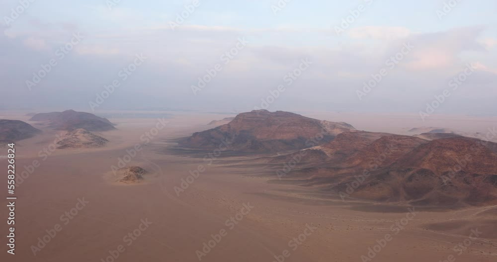 Aerial view of rock formations within Wadi Rum reserve in southern Jordan Aerial view of rock formations within Wadi Rum reserve in southern Jordan