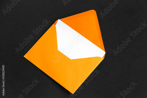 Bright orange open envelope...