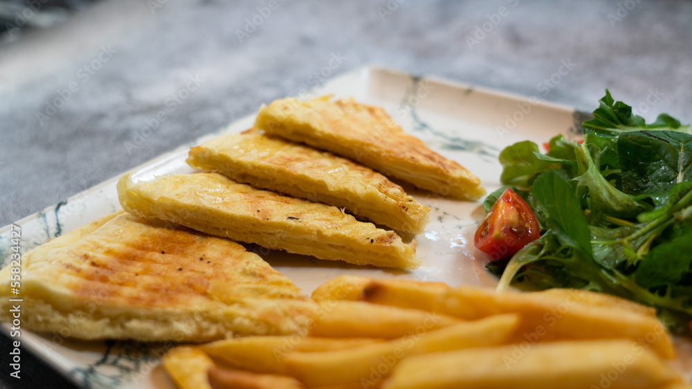 toast, french fries and greens platter toast, french fries and greens platter