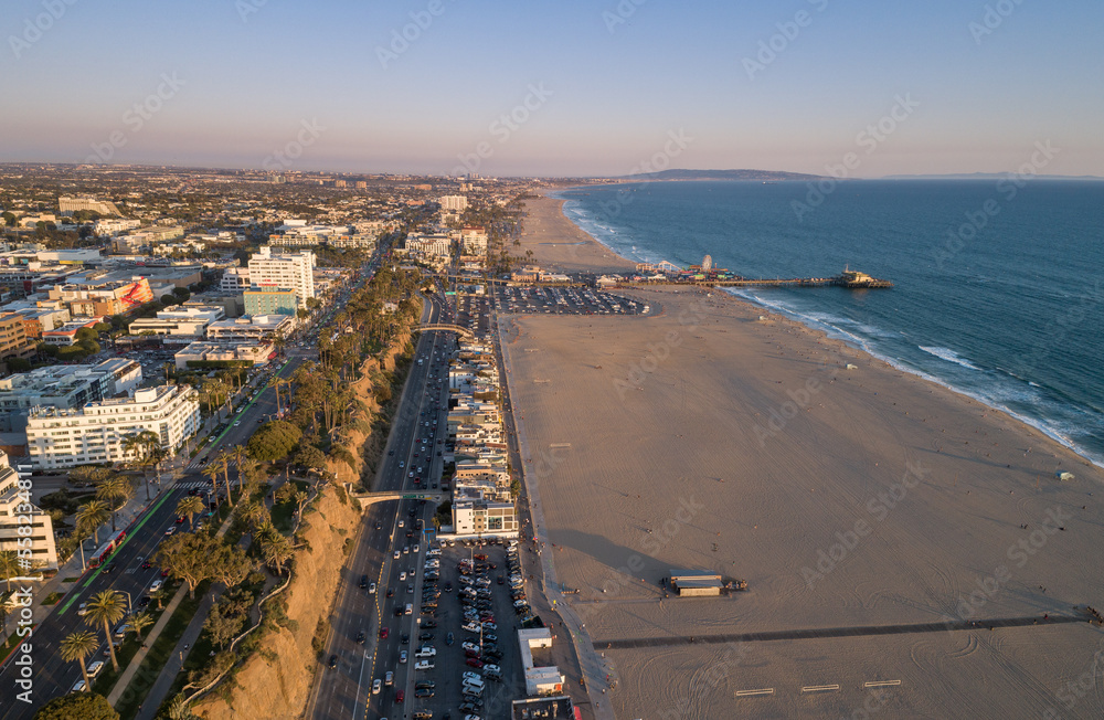 Sunset in Santa Monica, Los Angeles, California. Situated on Santa Monica Bay, it is bordered on three sides by the city of Los Angeles – Pacific Palisades, Brentwood, West Los Angeles.