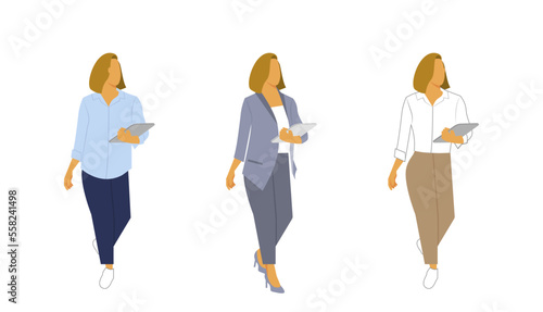 Women in different office cloth standing with laptop