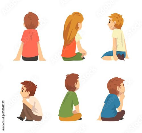 Cute little boys and girls sitting on floor and listening attentively set cartoon vector illustration