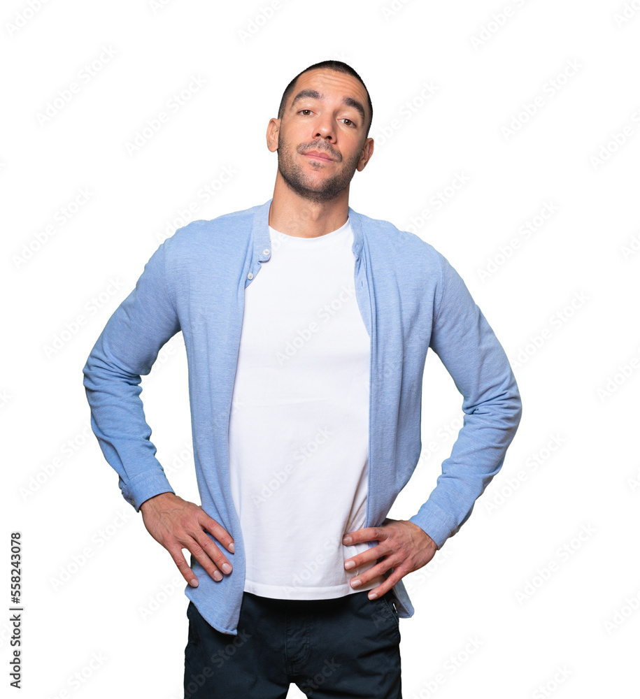 Tired young man posing against background Tired young man posing against background