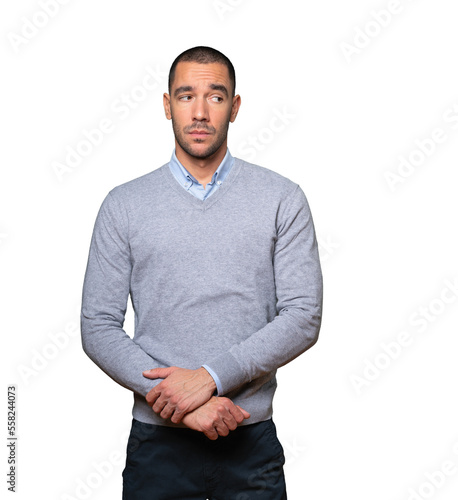 Hesitant young man looking gesture