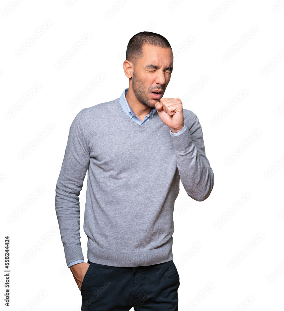 Sick young man coughing Sick young man coughing