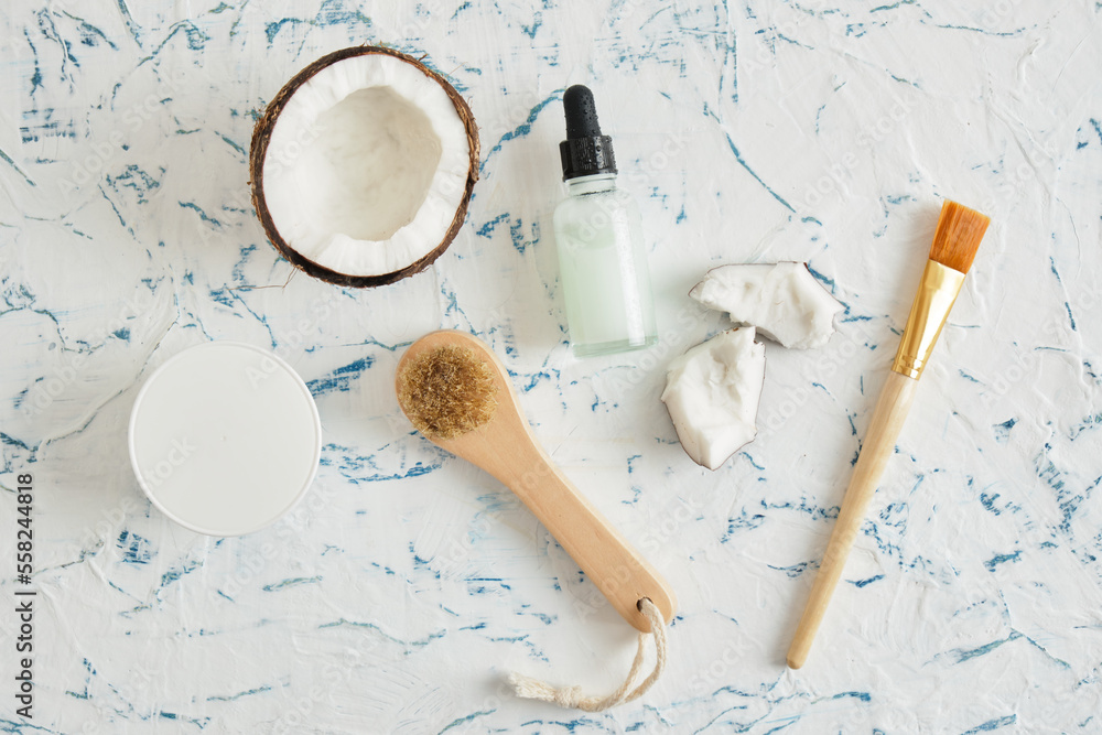 Natural organic coconut oil or serum in amber glass dropper bottle Natural organic coconut oil or serum in amber glass dropper bottle