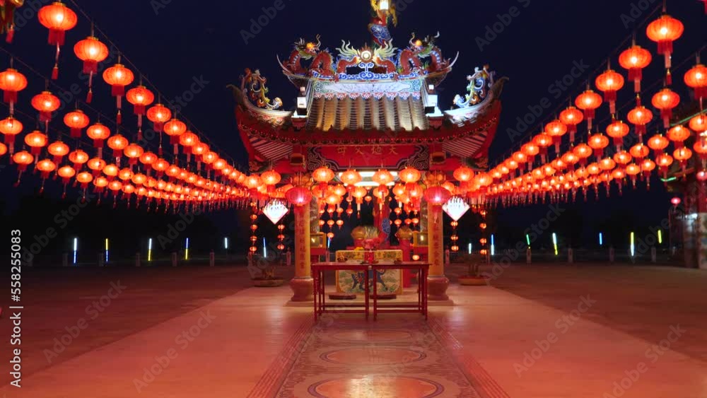 A quiet Chinese temple at night with lanterns hung throughout the courtyard in preparation for the upcoming Chinese New Year. A quiet Chinese temple at night with lanterns hung throughout the courtyard in preparation for the upcoming Chinese New Year.