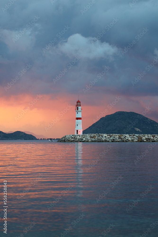 Seascape at sunshine. Lighthouse and sailings on the coast. Seaside town of Turgutreis and spectacular sunshine
Seascape at sunshine. Lighthouse and sailings on the coast. Seaside town of Turgutreis and spectacular sunshine