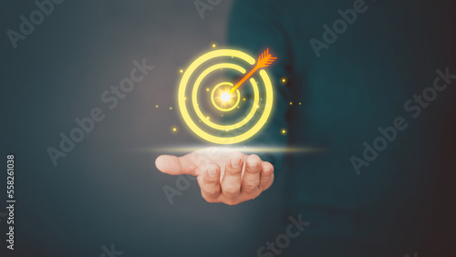 New year business ideas, goal icon in hand with target and goals in new year 2023, new concept coming in 2023 or future.