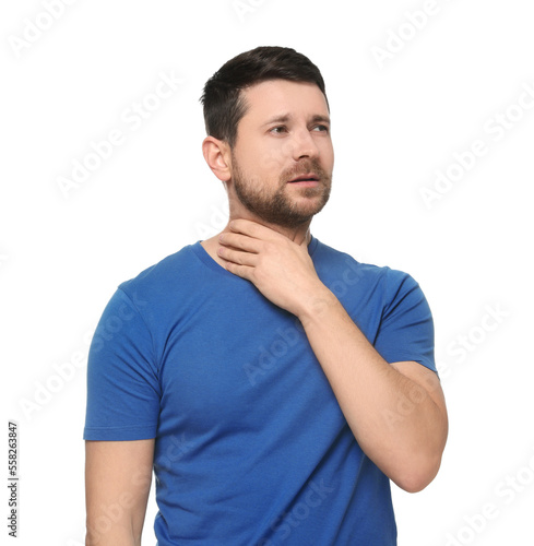 Man suffering from sore throat on white background