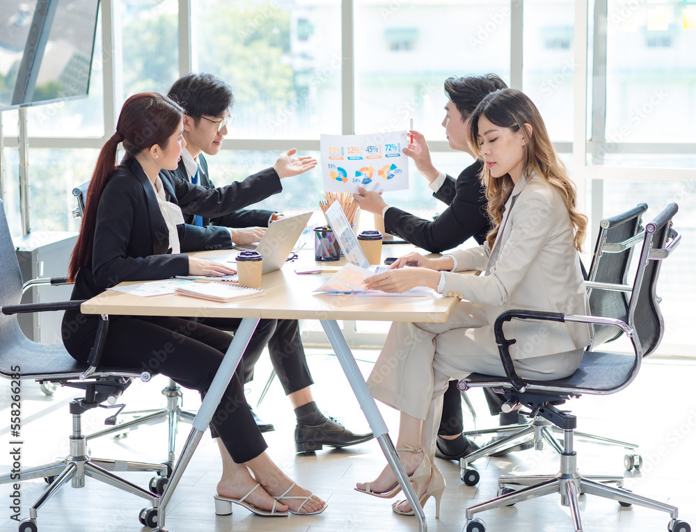 Fototapeta premium Millennial Asian young professional successful male female businessmen businesswomen employee in formal suit sitting smiling discussing communicating together in company office meeting room workplace