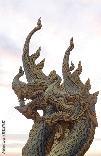 Golden Naga head stucco art