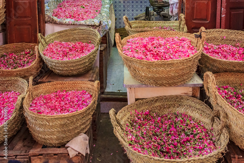 Rose petals in baskets at the souk, Moroccan market in the medina, Fes, Morocco