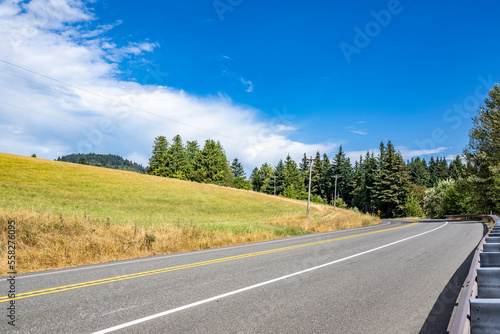 Local highway winding hillside road provides transport links in the Columbia Gorge region © vit