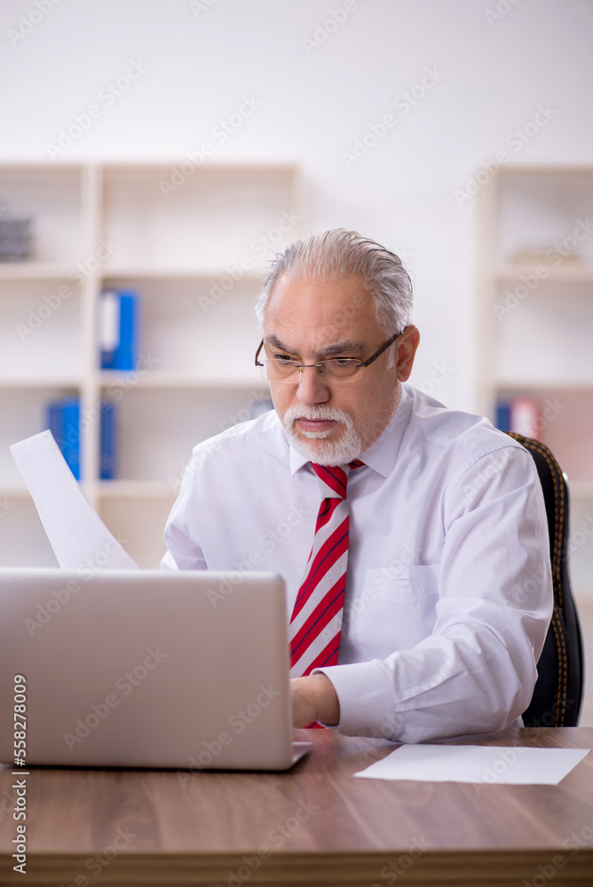 Old male employee and too much work in the office