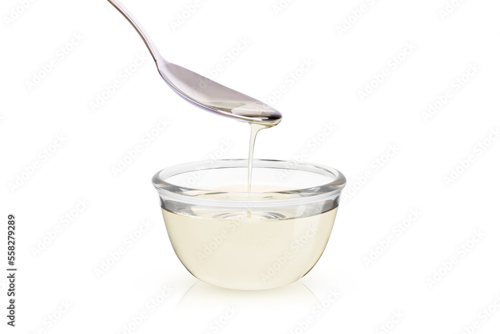 Sugar syrup in glass bowl isolated on white background Sugar syrup in glass bowl isolated on white background