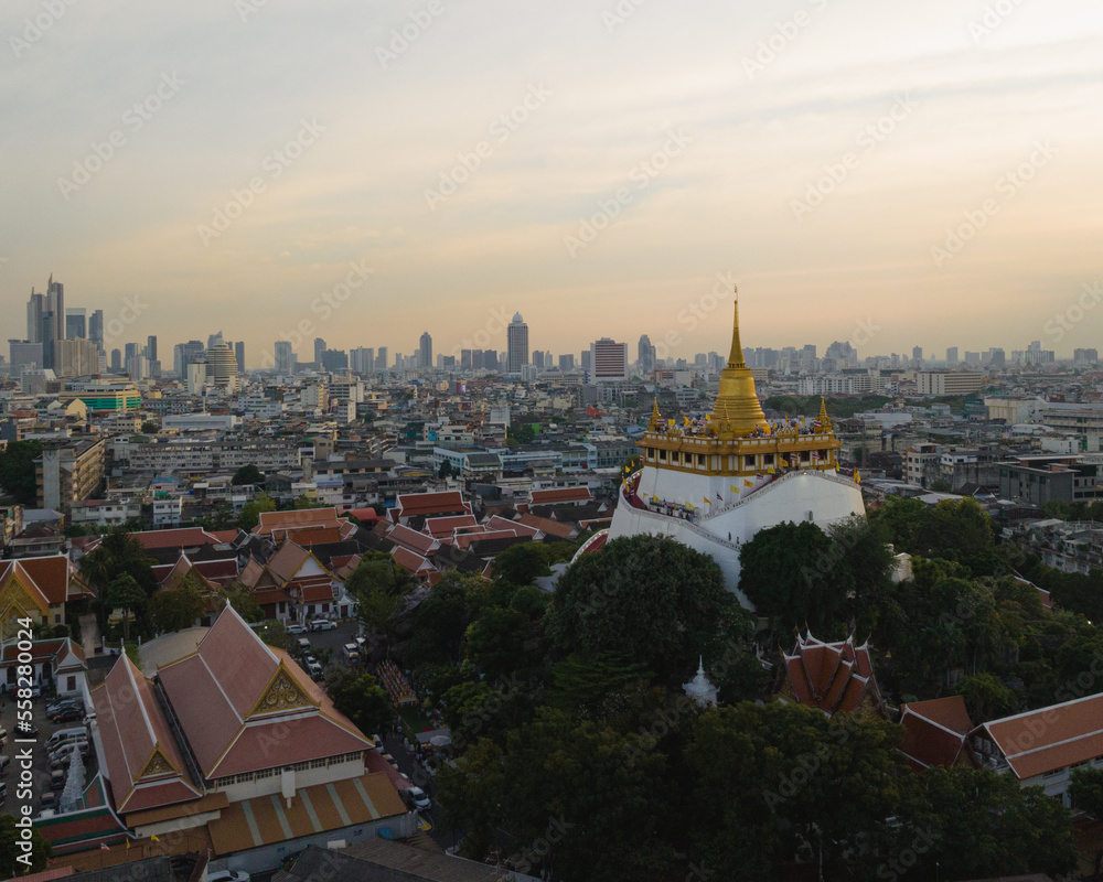 An aerial view of the Golden Mount stands prominently at Saket Temple, The most famous tourist attraction in Bangkok, Thailand.