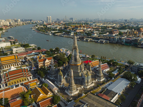 An aerial view of the Pagoda stands prominently at Wat Arun Temple with Chao Phraya River  The most famous tourist attraction in Bangkok  Thailand.