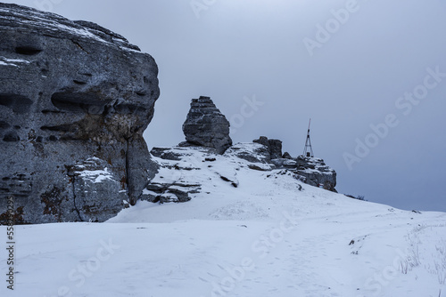 Rocks on the top of Mount Alenga. Southern Demerdzhi in snow and ice in spring. Crimea